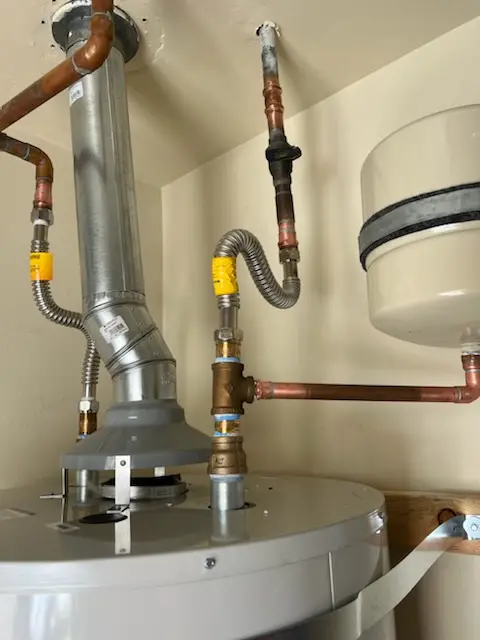 Water heater installation and plumbing repair in Rex